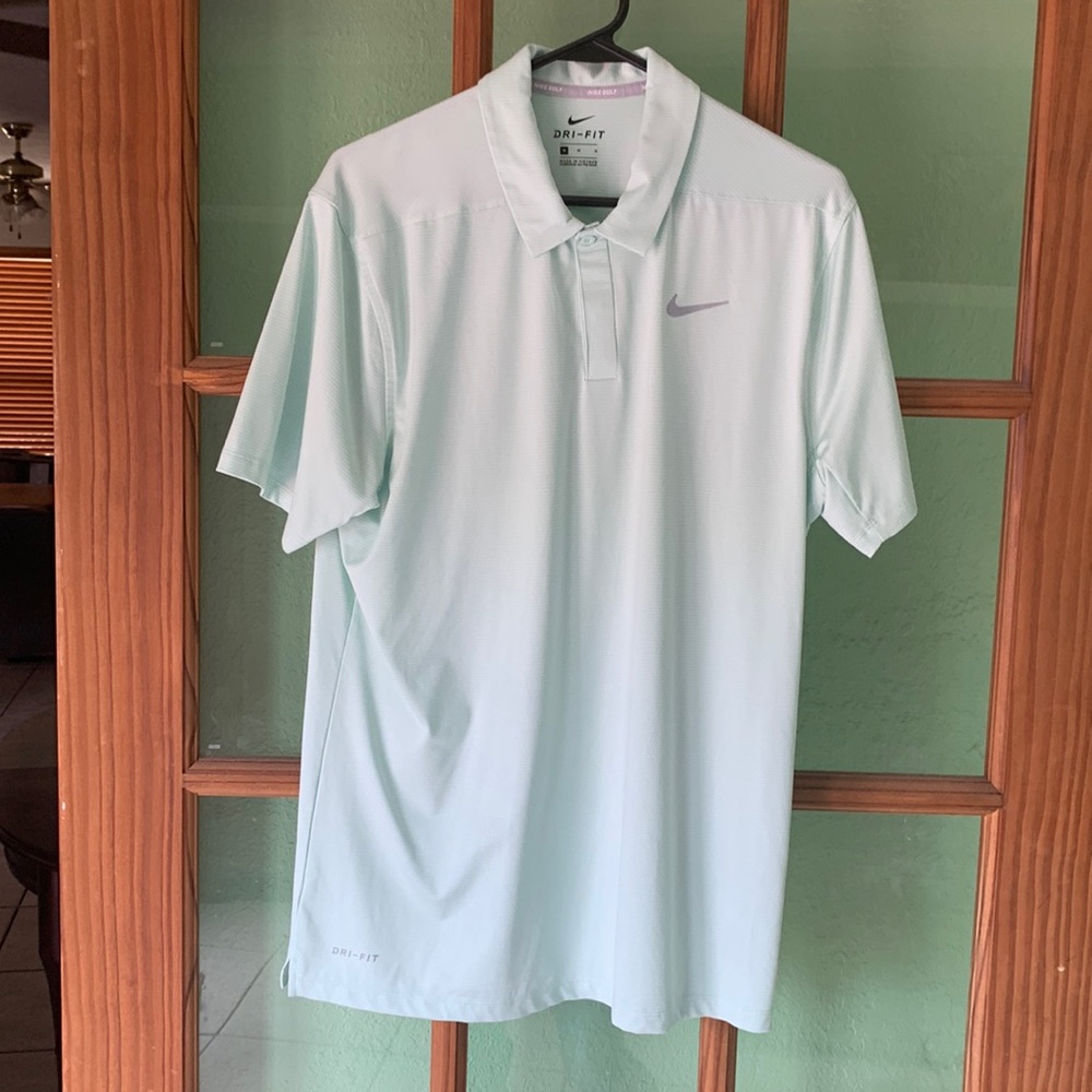 Nike golf polo. Light teal and white. Medium. Exc cond